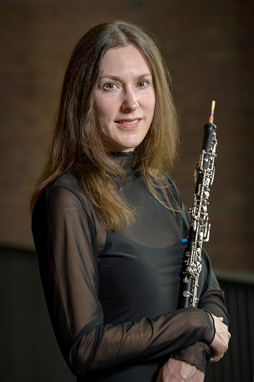 Photo of Tamsin with an oboe